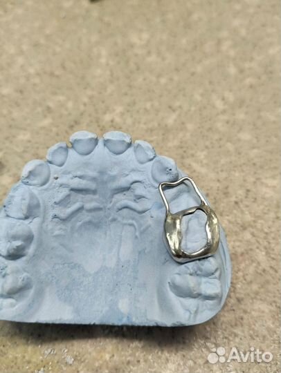 Зубной техник ортодонт