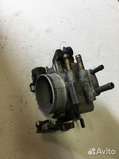 Дроссельная заслонка Opel Astra G X14XE