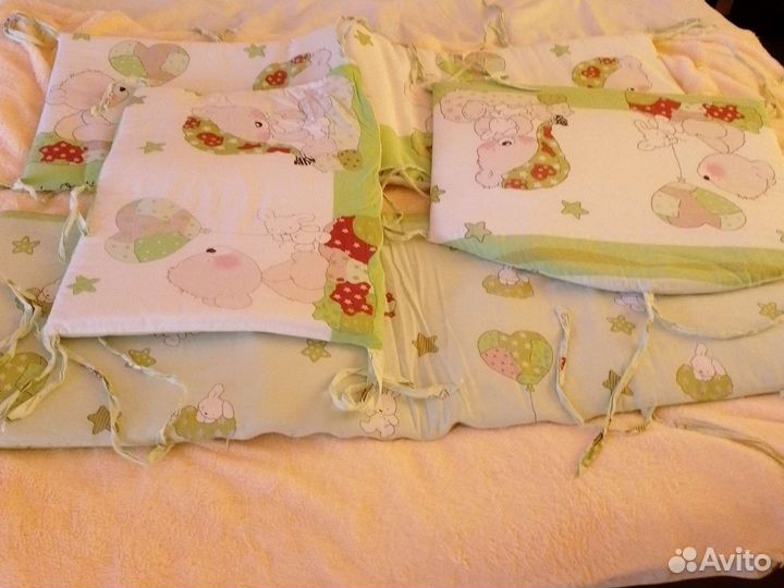 Детская кроватка с продольным маятником