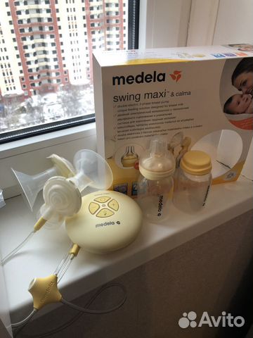 Молокоотсос medela swing maxi