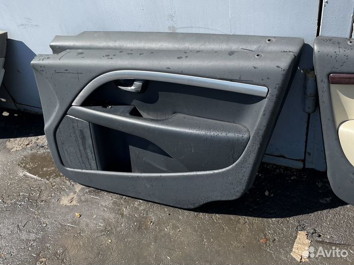 Обшивка передних дверей на Volvo S80,XC70