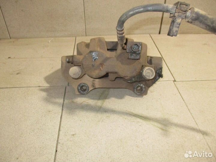 Суппорт передний правый Jeep Grand Cherokee 4