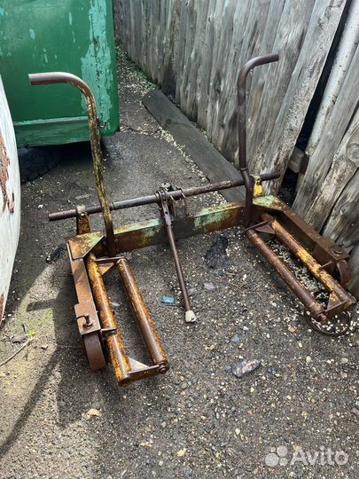 Механизм для снятия колес грузового автомобиля