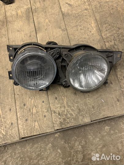 Фара левая BMW E34 E32