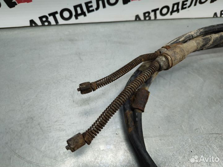 Трос стояночного тормоза Honda Logo GA3 1996 г.в