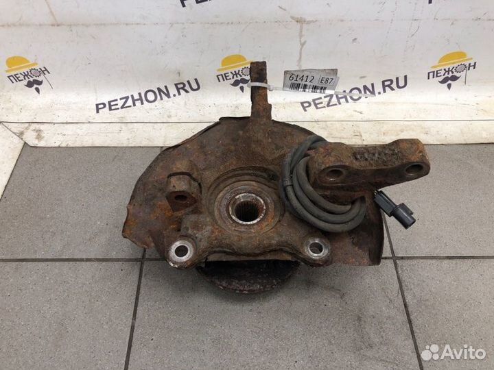 Кулак поворотный передний левый Mitsubishi Lancer