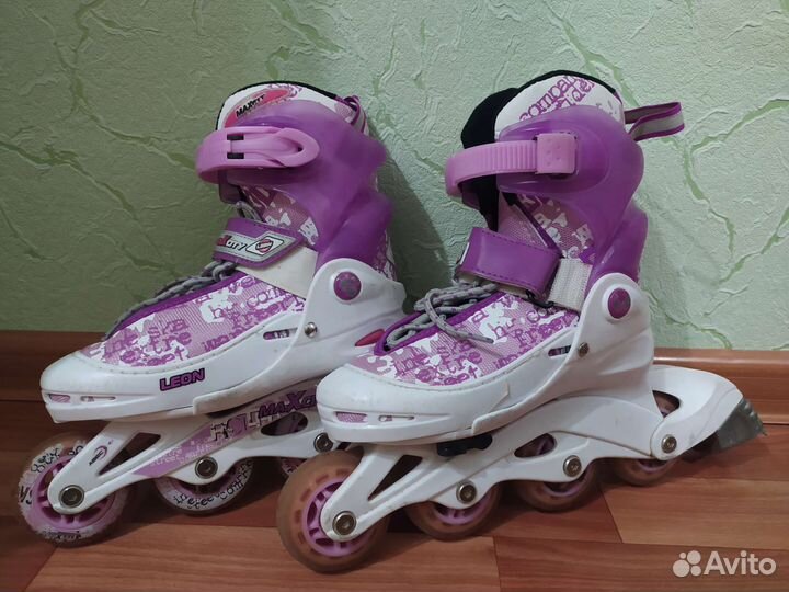 Роликовые коньки