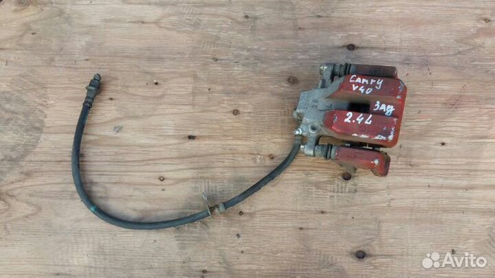 Суппорт тормозной левый Toyota Camry V40 2006-2011