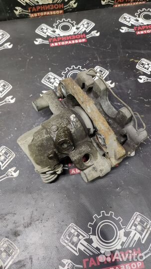 Задний тормозной суппорт Форд Фокус Ford Focus 2