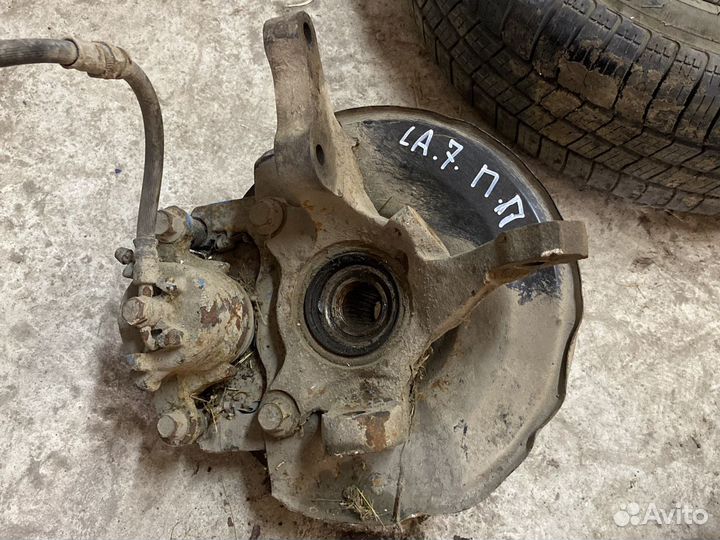 Поворотный кулак Mitsubishi Lancer 7