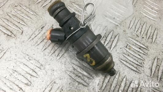 Форсунка бензиновая mitsubishi carisma (KSE03B702)