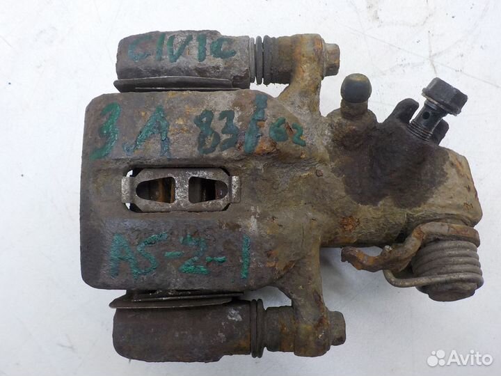 Суппорт тормозной задний левый Honda Civic VII 200