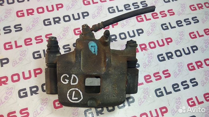 Суппорт передний GD L б/у 626 Capella