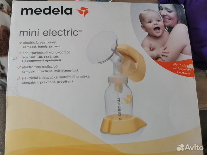 Молокоотсос medela электрический