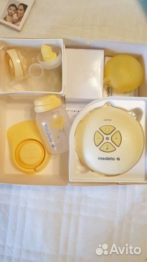 Молокоотсос medela электрический