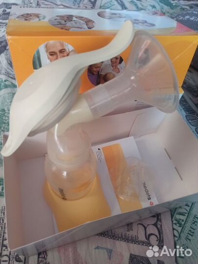 Молокоотсос medela