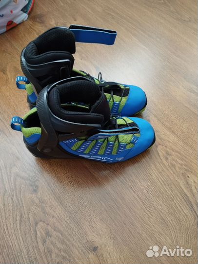 Лыжные ботинки коньковые spine