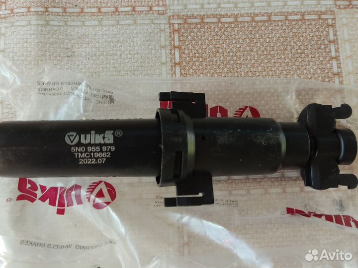 Форсунка омывателя фары tiguan