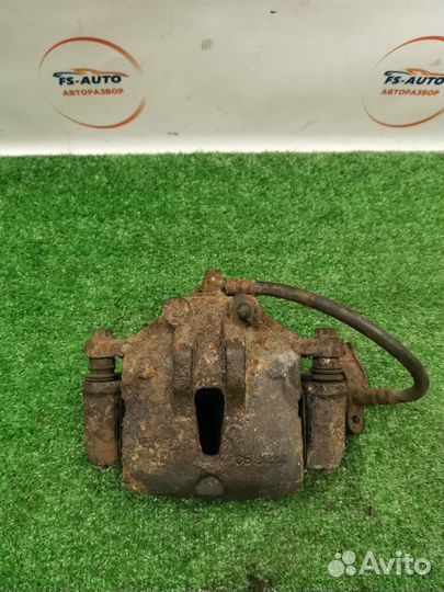 Суппорт тормозной передний правый Kia Ceed хетчбэк