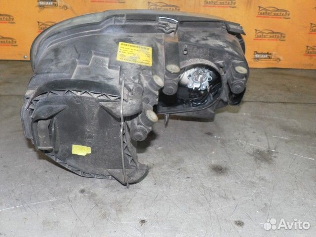 Фара левая Volkswagen Touran I (2003—2006) 8SLA5A