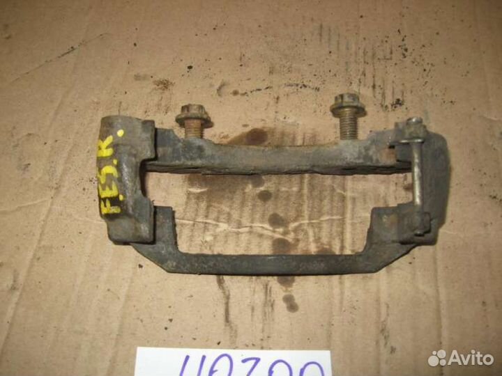 Скоба суппорта переднего правого Ford Escort/Orion