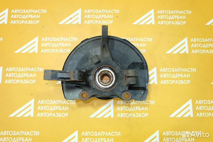 Кулак поворотный перед правый Mitsubishi Lancer X