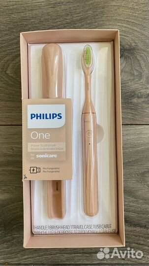 Электрическая зубная щетка Philips