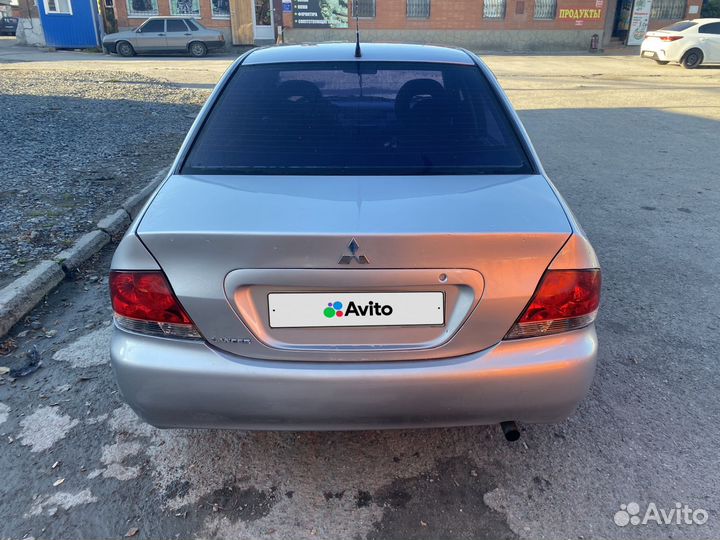 Mitsubishi Lancer 1.6 МТ, 2005, 296 000 км