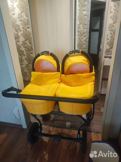 Коляска для двойни