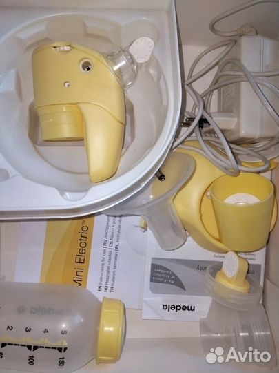 Молокоотсос medela электрический