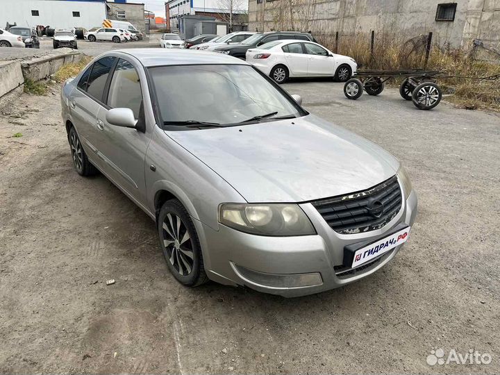 Щит опорный задний левый Nissan Almera Classic (B1