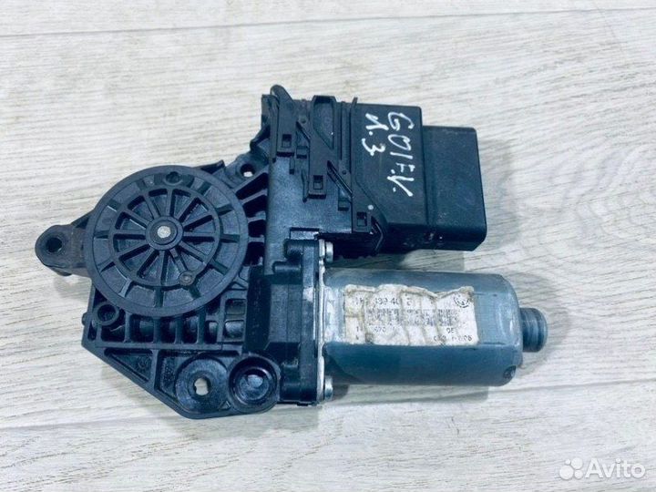 Моторчик стеклоподъемника задний левый Volkswagen