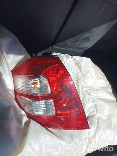 Задний левый стопарь honda fit