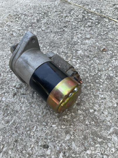 Стартер новый Geely MK