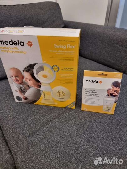 Молокоотсос medela электрический