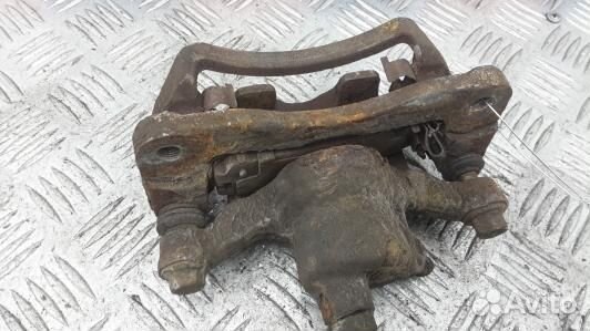 Суппорт тормозной задний левый mitsubishi galant 8