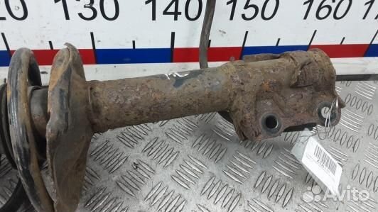 Стойка передняя левая nissan almera N16 (ZNI06K501