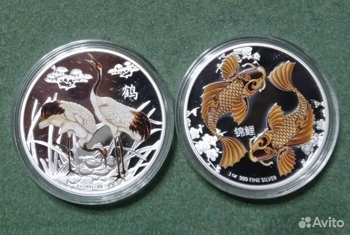 Монеты Ниуэ Фэн-шуй Журавли Рыбы Серебро