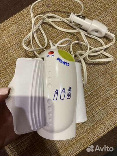 Подогреватель для детскаго питания Саге в машину