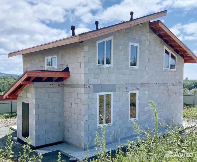 Строительство дачных домов. Бригада строителей