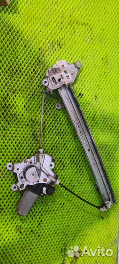 Стеклопод электр. задний левый Mitsubishi Lancer 9