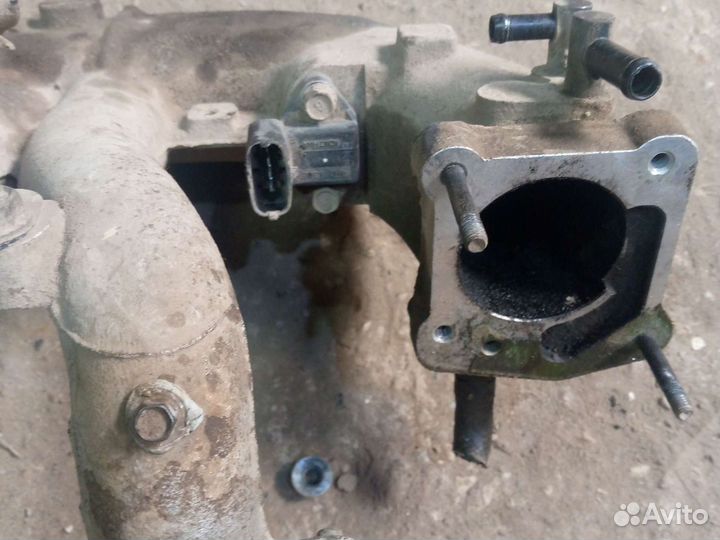 Впускной коллектор Kia Spectra 1