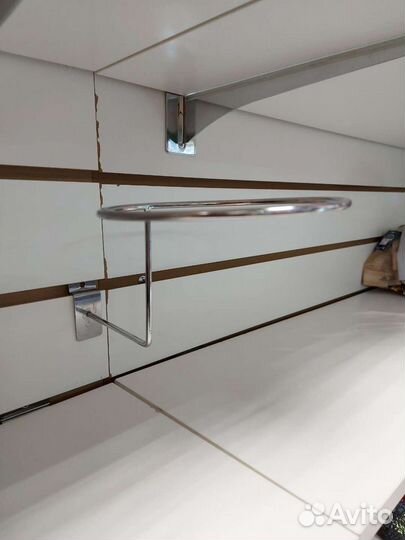 Кронштейн крючок на эканомпанэль для гол. уборов