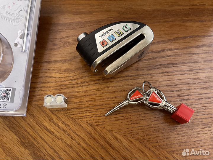 Замок на диск мотоцикла с сигнализацией