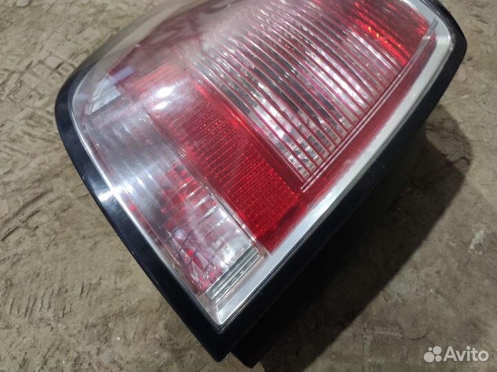 Фонарь задний левый Opel Astra H универсал