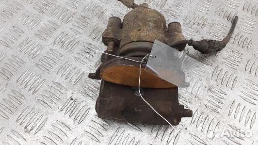 Суппорт тормозной передний левый skoda octavia A5