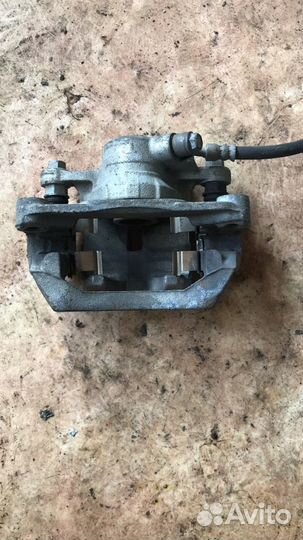 Суппорт тормозной задний левый для Subaru Forester