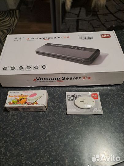 Вакуумный упаковщик