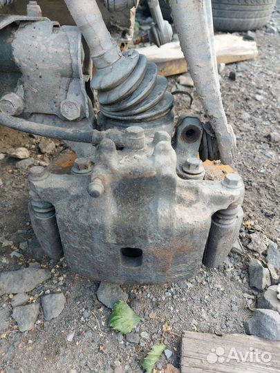 Суппорт передний P, L Mitsubishi Lancer 9