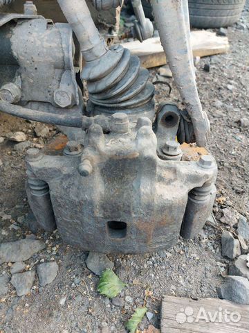 Суппорт передний P, L Mitsubishi Lancer 9